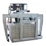 Дворукий блок і цегляний затискач